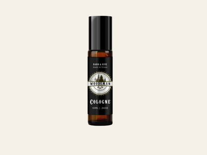 Bottle of Woodsmoke cologne on a white background