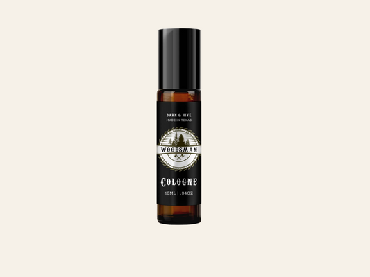 Bottle of Woodsmoke cologne on a white background